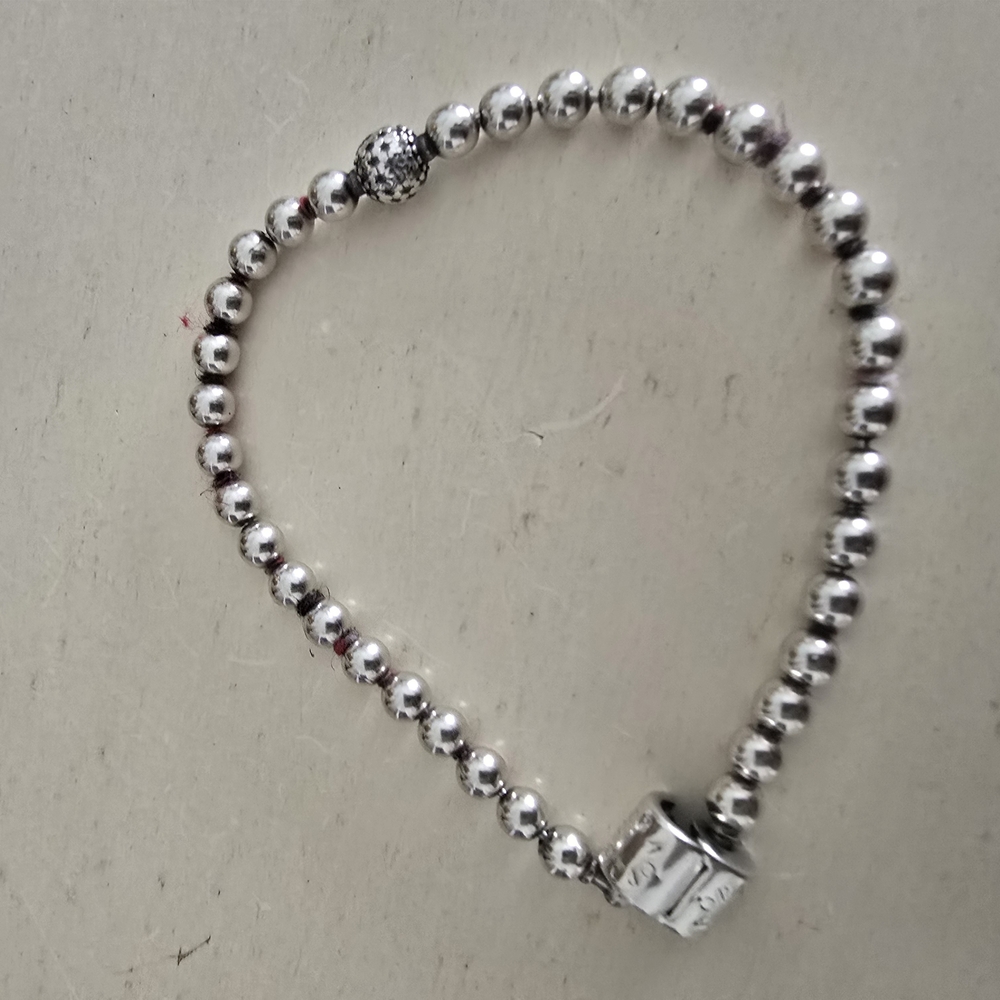 Pandora Silver Bracelet with Intricate Accent Bead